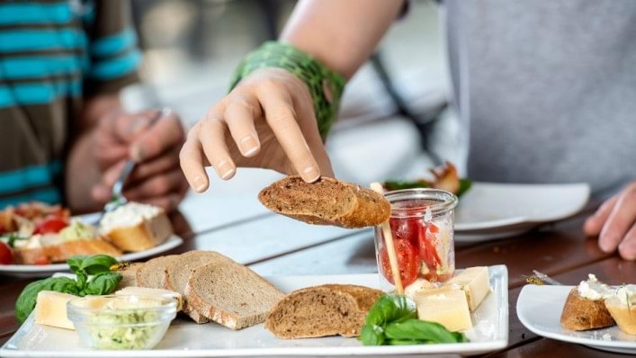 Myo plus being used to pick up food