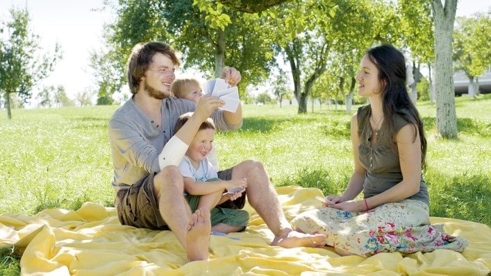 Michelangelo prosthetic hand user with family picnic